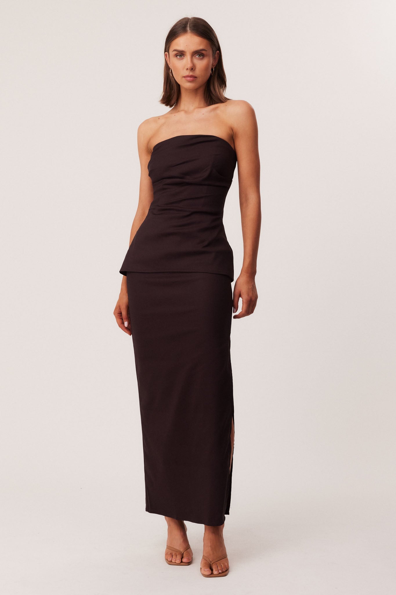 Image of a model wearing Skirts. Productname: SNDYS MIMI MAXI SKIRT in Chocolate colour by brand - SNDYS