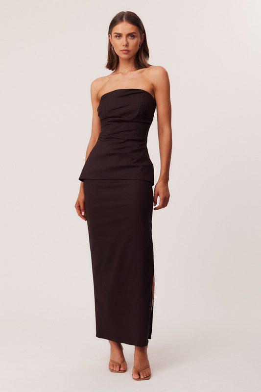 Image of a model wearing Skirts. Productname: SNDYS MIMI MAXI SKIRT in Chocolate colour by brand - SNDYS