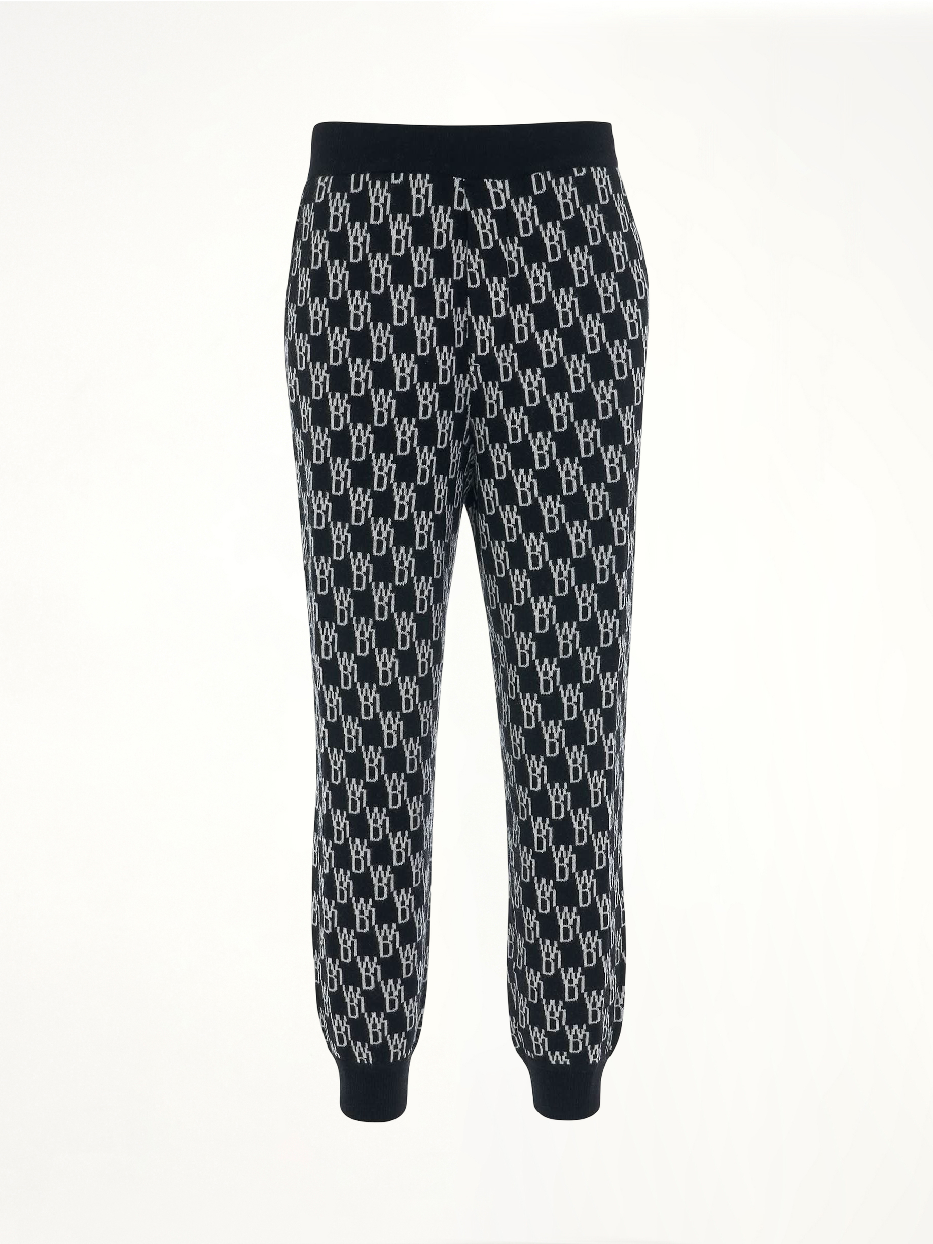 Image of a model wearing Pants. Productname: WE11DONE Monogram Knit Jacquard Trouser in Black colour by brand - WE11DONE