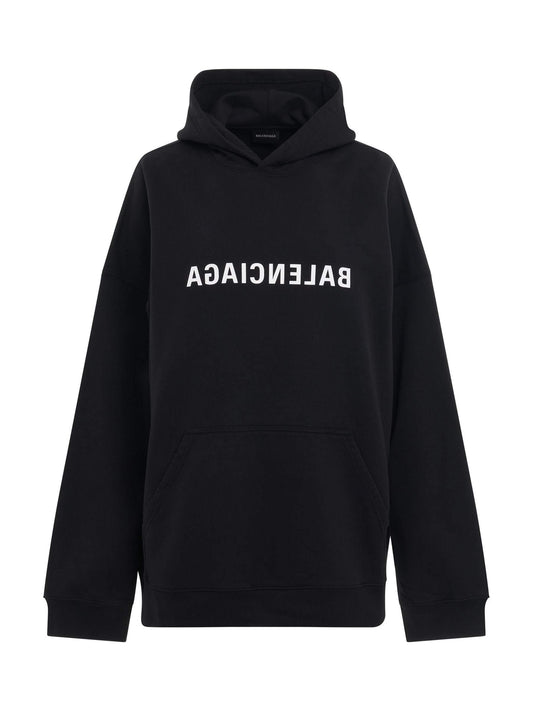Image of a model wearing Outerwear. Productname: BALENCIAGA Mirror Print Wide Fit Hoodie in Black colour by brand - BALENCIAGA