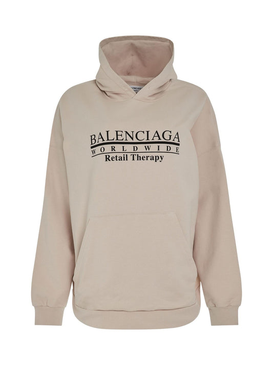 Image of a model wearing Outerwear. Productname: BALENCIAGA Retail Therapy Wide Fit Hoodie in Chalky Black colour by brand - BALENCIAGA