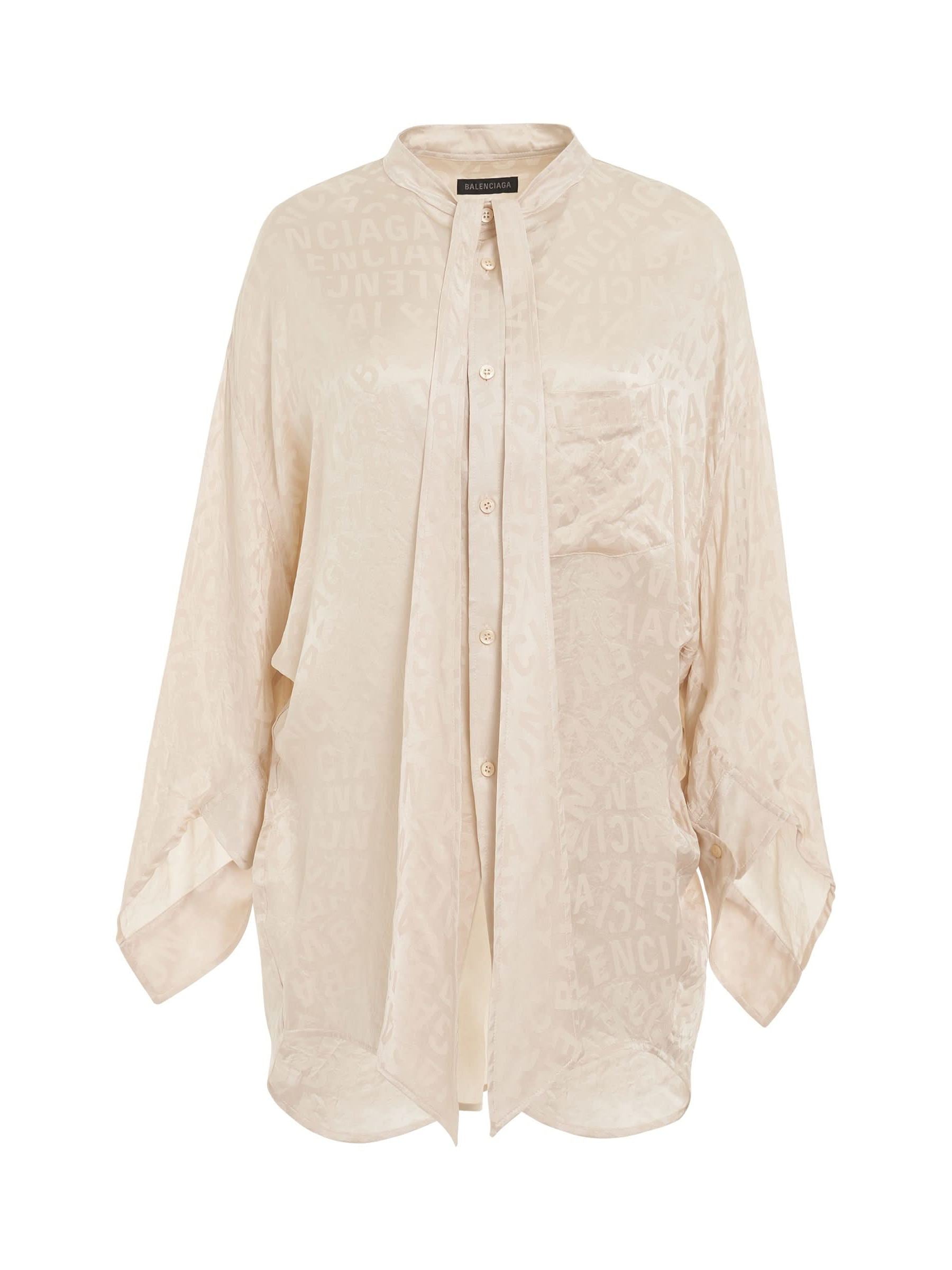 Image of Blouses. Productname: BALENCIAGA Twisted Swing Blouse in Dusty Ivory colour by brand - BALENCIAGA