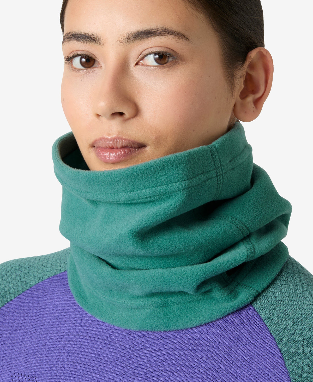 Image of a model wearing Outerwear. Product name - DAYBREAKER FLEECE NECK, Opal Green in Opal Green colour by brand - Helly Hansen