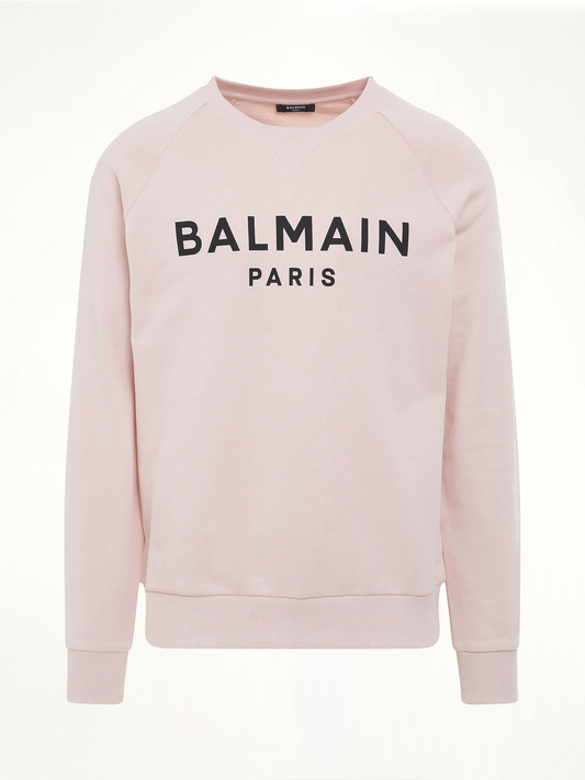 Image of a model wearing Outerwear. Product name - Classic Logo Print Sweatshirt in Pink colour by brand - BALMAIN