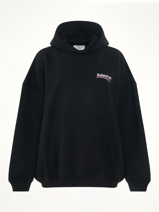 Image of a model wearing Outerwear. Productname: BALENCIAGA Embroidered Political Campaign Oversized Hoodie in Black colour by brand - BALENCIAGA