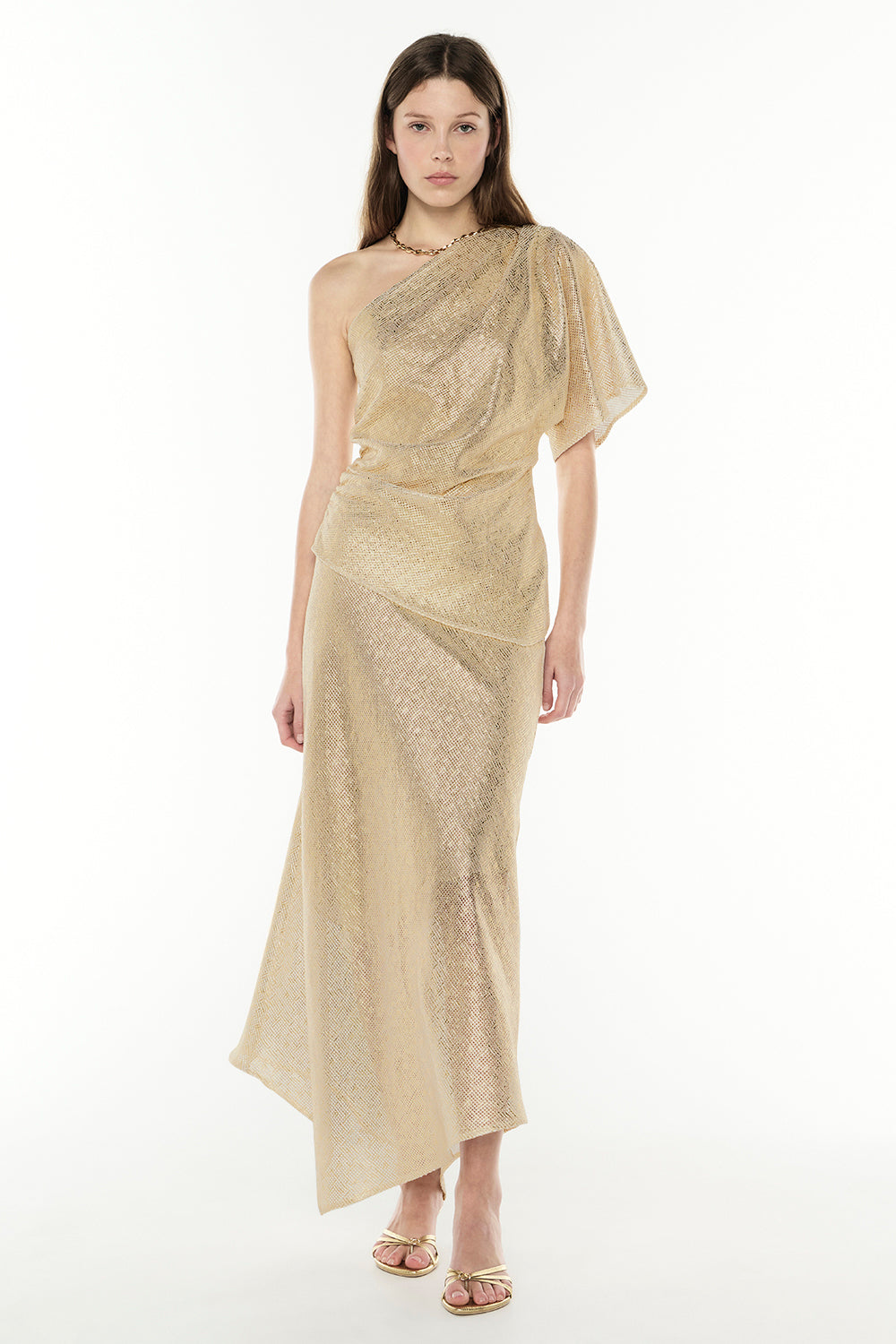Image of a model wearing Skirts. Productname: Illuminated Skirt in Gold colour by brand - Manning Cartell