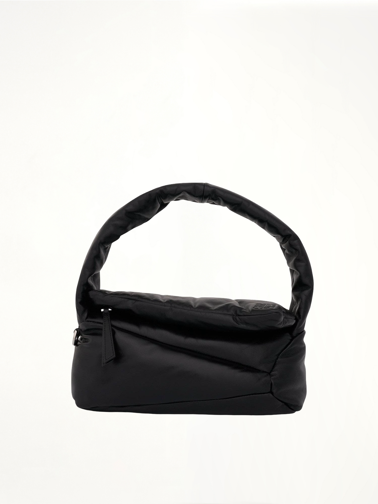 Image of a model wearing Outerwear. Productname: LOEWE Puffer Puzzle Hobo Bag in Black colour by brand - LOEWE