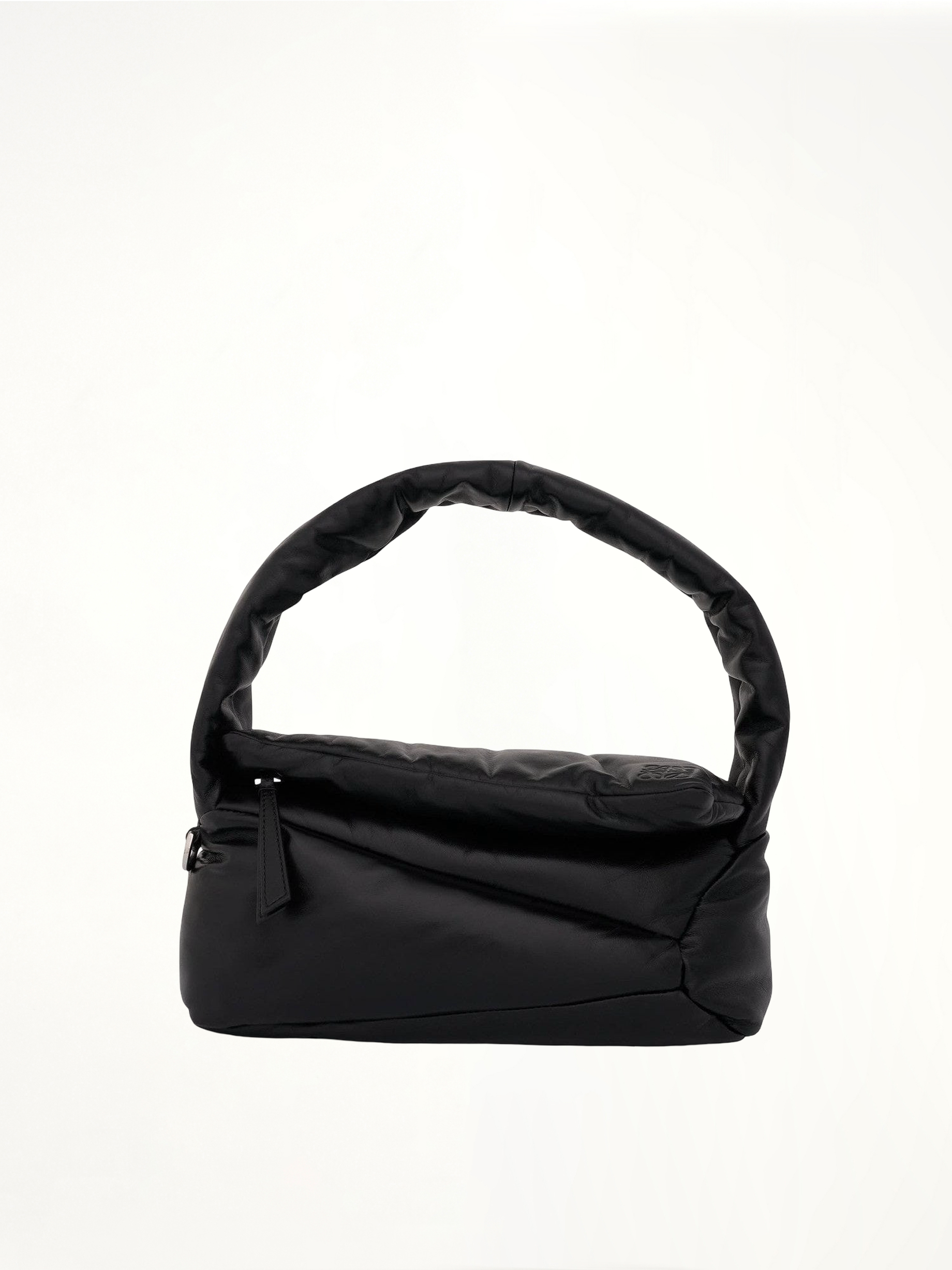 Image of a model wearing Outerwear. Productname: LOEWE Puffer Puzzle Hobo Bag in Black colour by brand - LOEWE