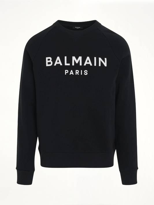Image of a model wearing Outerwear. Productname: BALMAIN Classic Logo Print Sweatshirt in Black colour by brand - BALMAIN