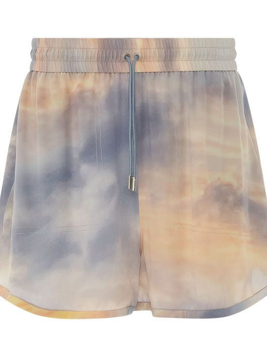 Image of a model wearing Shorts. Productname: ALEXANDER MCQUEEN Daybreak Explorer Shorts in Blue Yellow colour by brand - ALEXANDER MCQUEEN