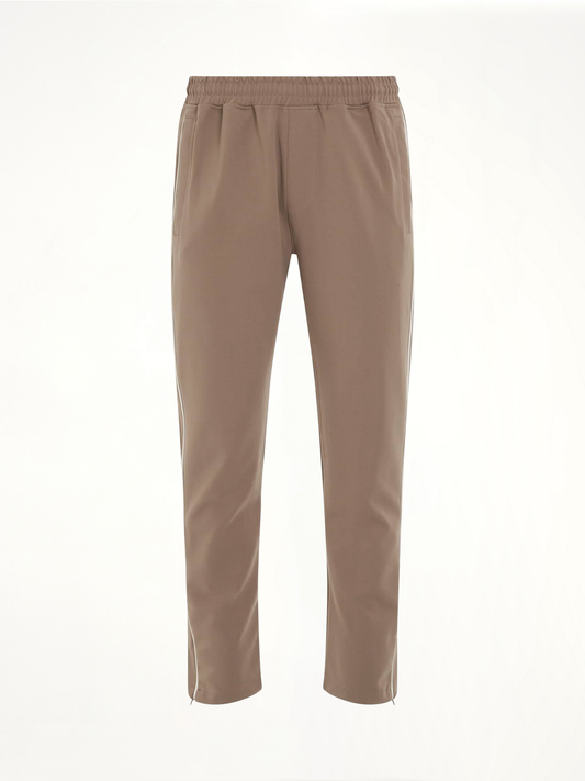 Image of a model wearing Pants. Productname: REPRESENT Interlock Split Trackpant in GREY colour by brand - REPRESENT