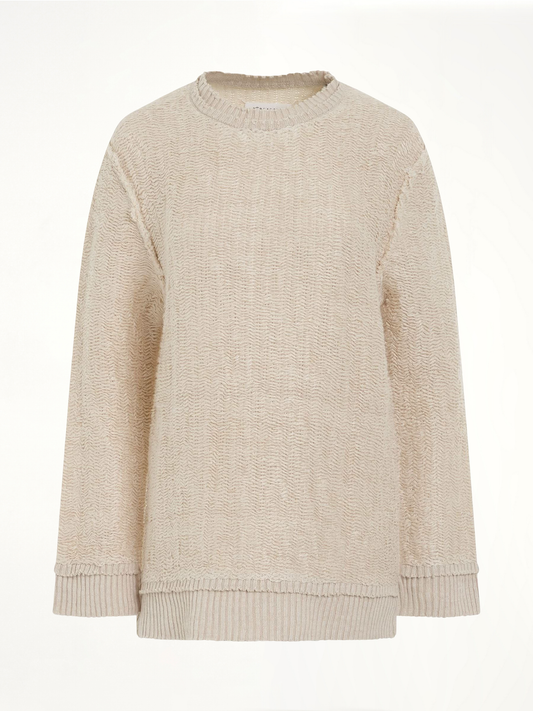 Image of a model wearing Outerwear. Productname: MAISON MARGIELA Raw Woven Oversize Knit Sweater in BEIGE colour by brand - MAISON MARGIELA