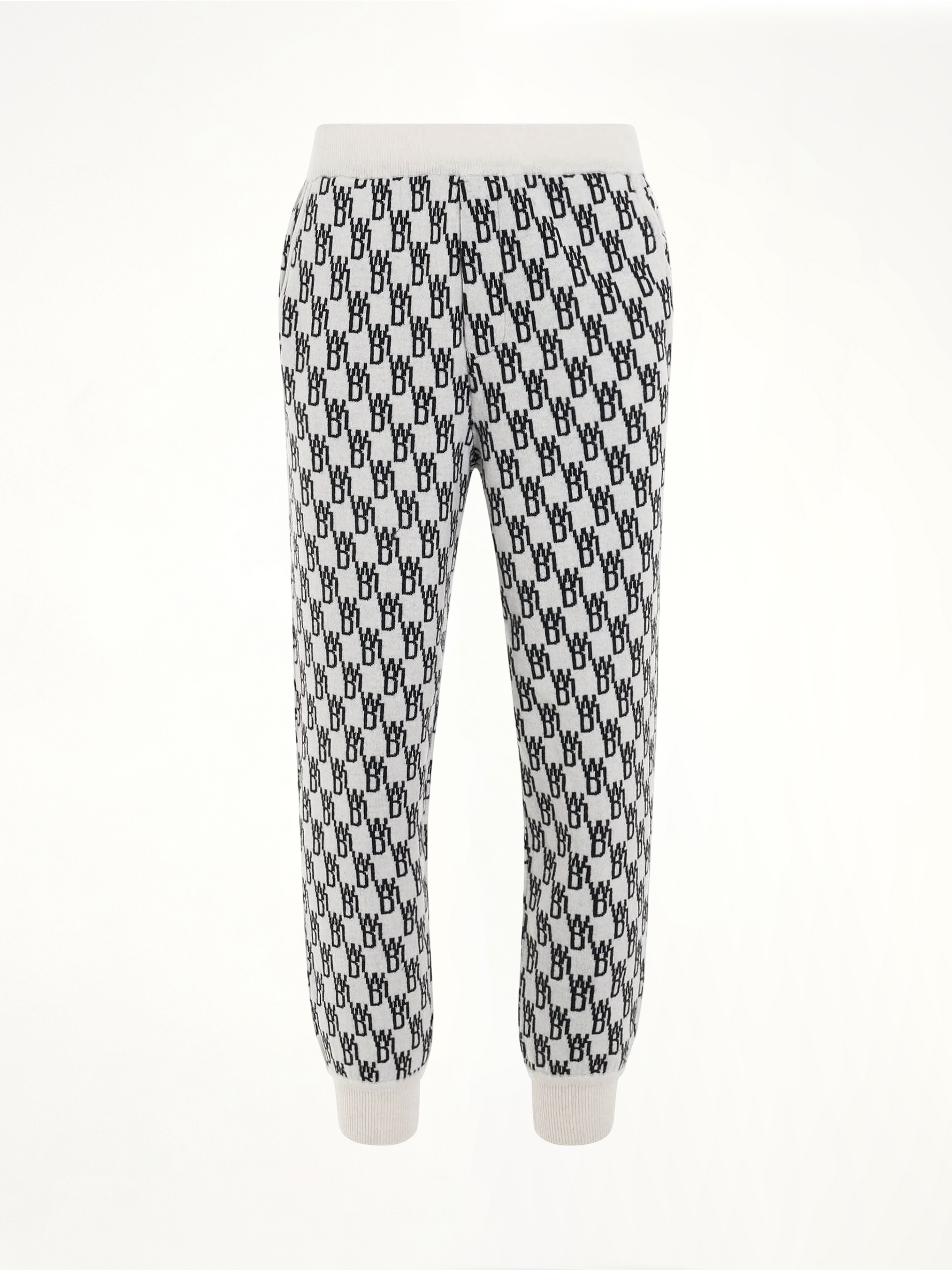 Image of a model wearing Pants. Productname: WE11DONE Logo Knit Jacquard Trouser in White colour by brand - WE11DONE