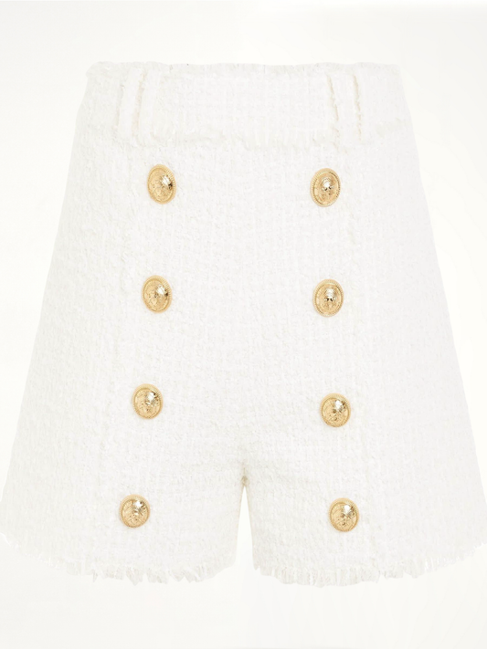 Image of a model wearing Shorts. Productname: BALMAIN High Waisted 8 Buttons Shorts in WHITE colour by brand - BALMAIN