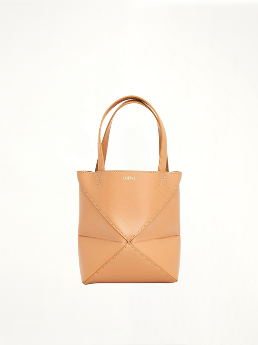 Image of Bags. Product name - Mini Puzzle Fold Tote Bag in Brown colour by brand - LOEWE