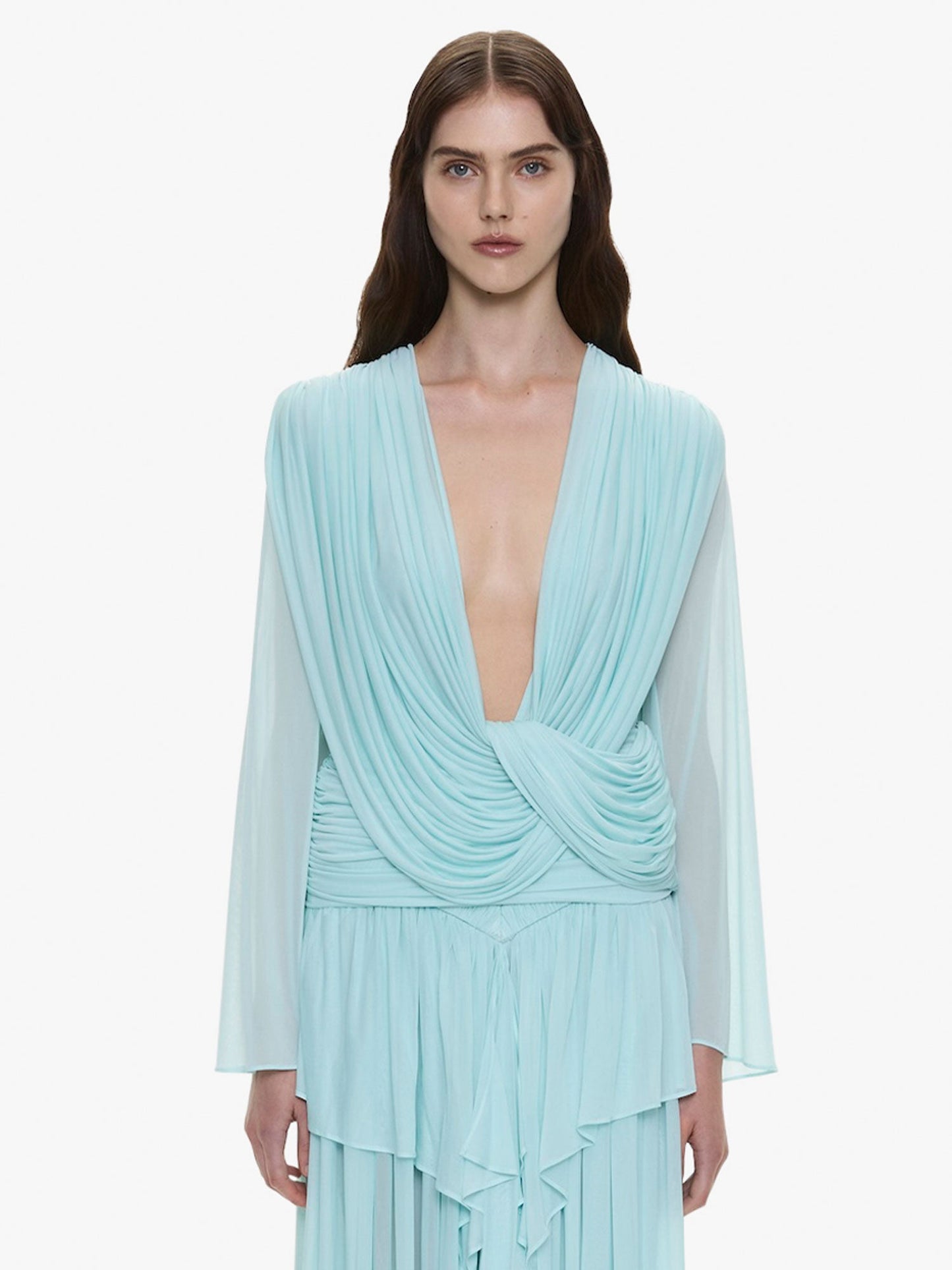 Image of a model wearing Tops. Product name - Ripple Drape Long Sleeve Top in Mint colour by brand - CHRISTOPHER ESBER