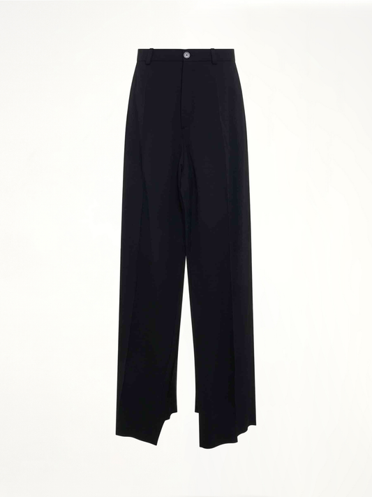Image of a model wearing Pants. Productname: BALENCIAGA Deconstructed Double Front Pants in BLACK colour by brand - BALENCIAGA