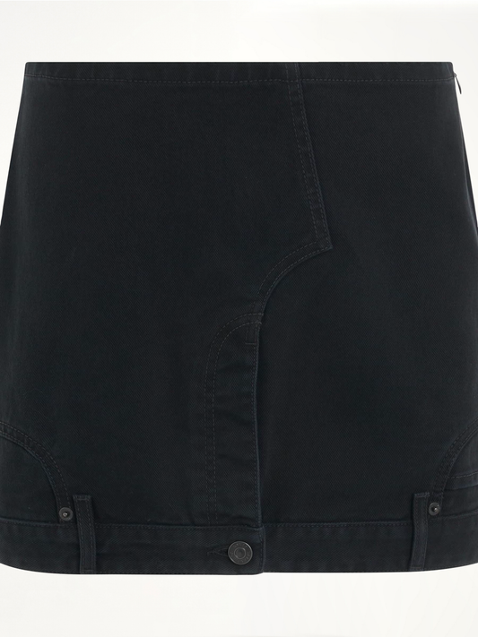 Image of a model wearing Skirts. Productname: BALENCIAGA Upside Down Denim Mini Skirt in BLACK colour by brand - BALENCIAGA