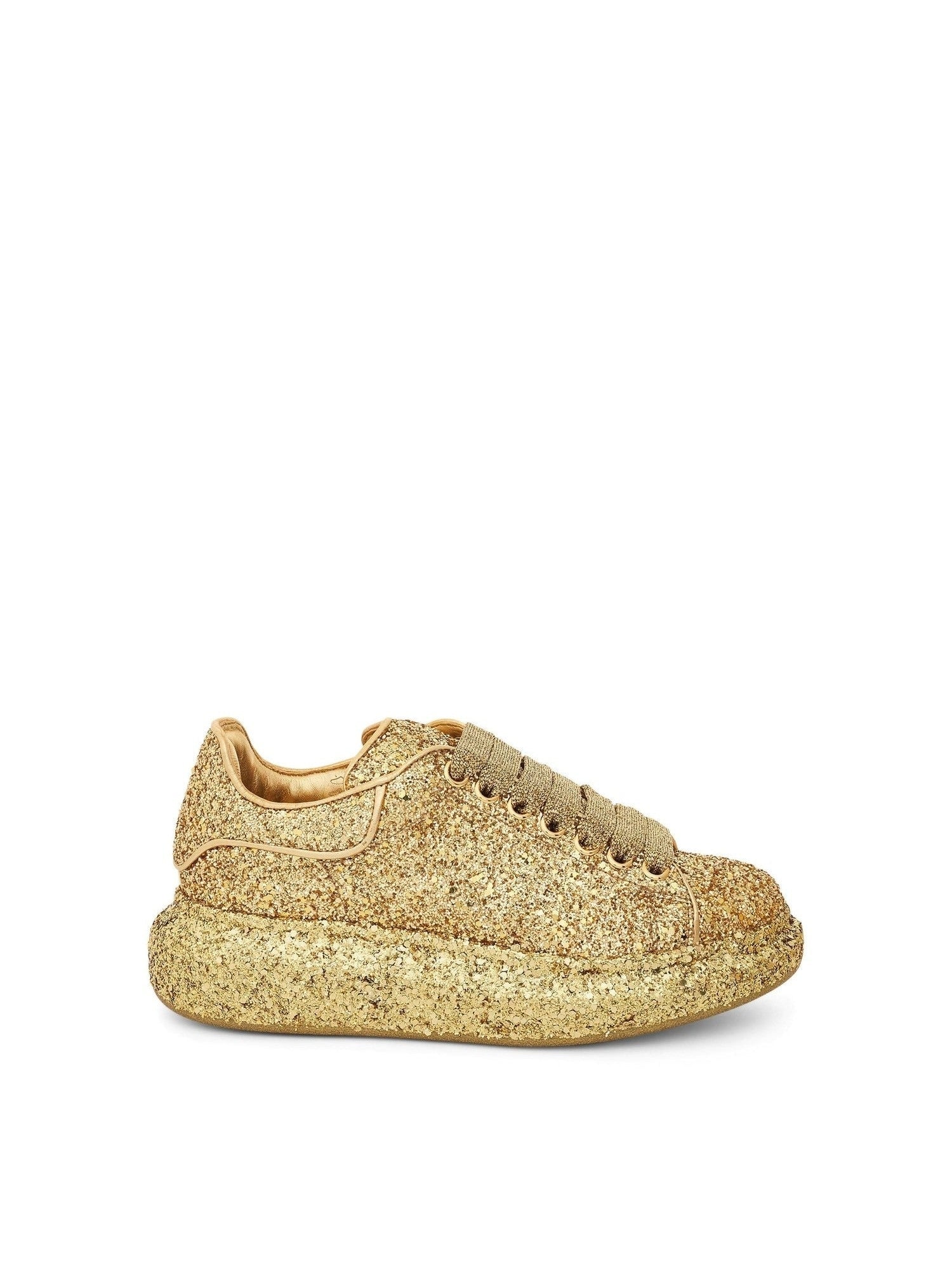 Image of Sneakers. Productname: ALEXANDER MCQUEEN Larry Oversized Heel Glitter Sneaker in GOLD colour by brand - ALEXANDER MCQUEEN
