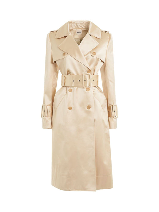 Image of a model wearing Outerwear. Productname: KHAITE Jaden Trench Coat in WHITE colour by brand - KHAITE