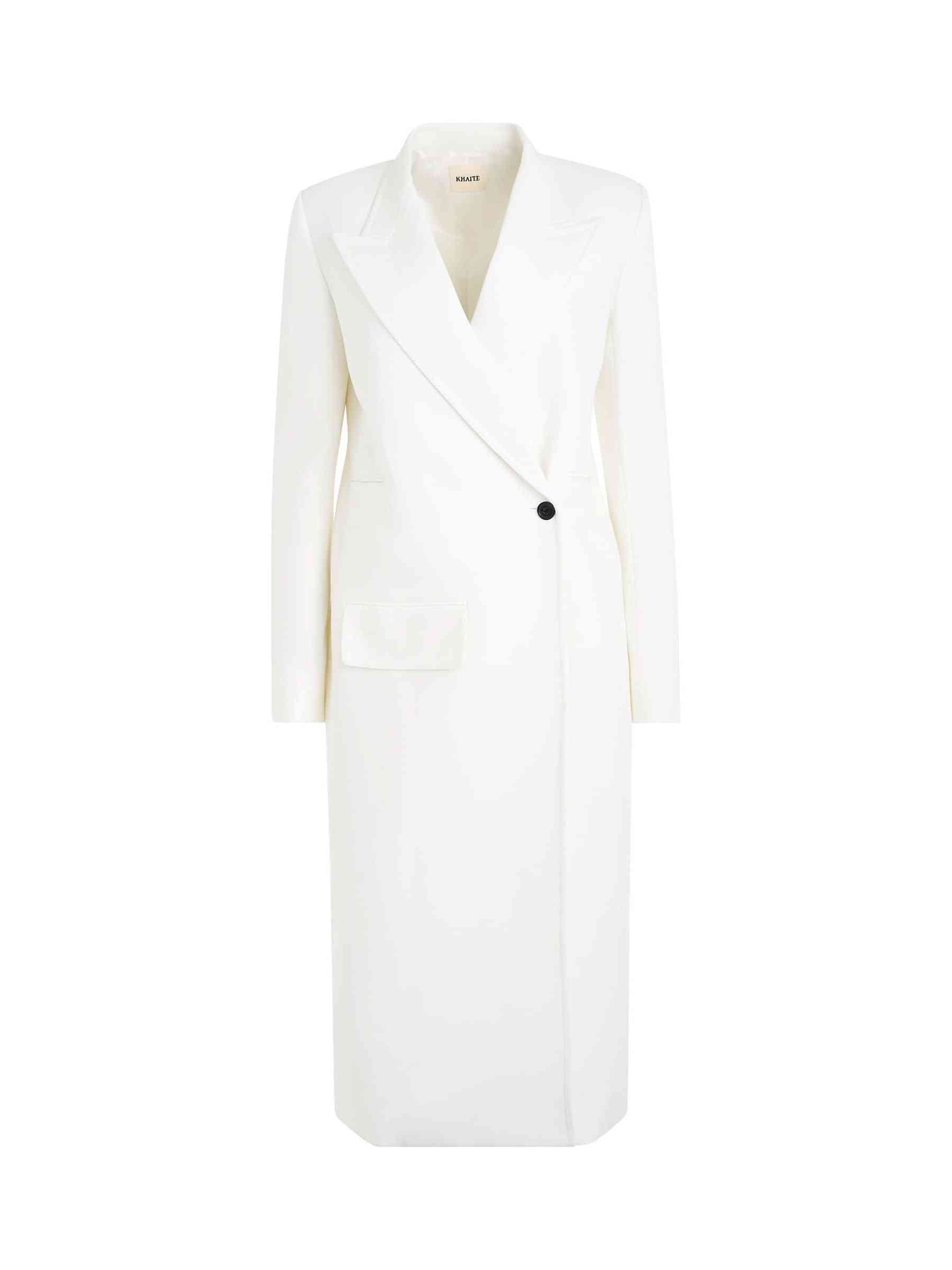 Image of a model wearing Outerwear. Product name - Cobble Coat in White colour by brand - KHAITE