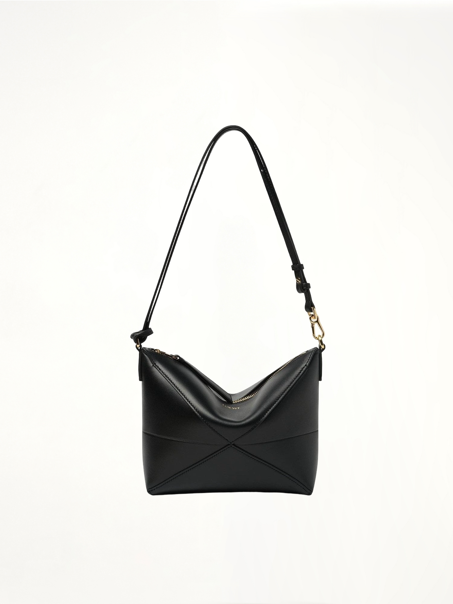 Image of Bags. Product name - Puzzle Fold Pouch in Black colour by brand - LOEWE