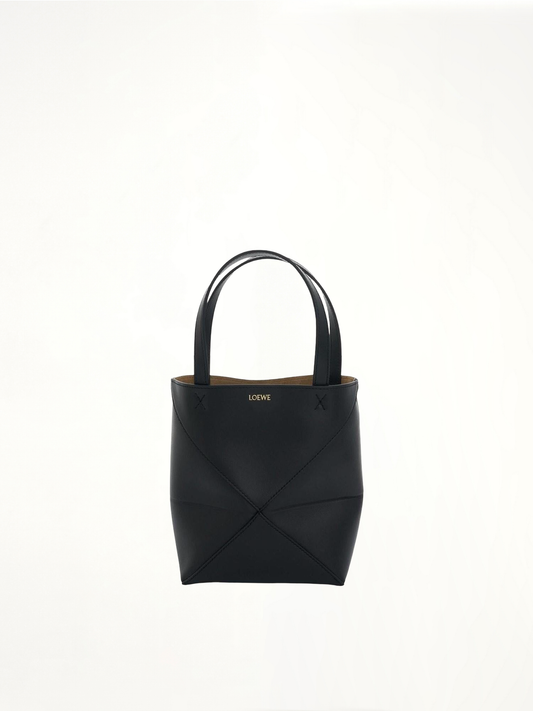 Image of Bags. Product name - Mini Fold Puzzle Tote Bag in Black colour by brand - LOEWE