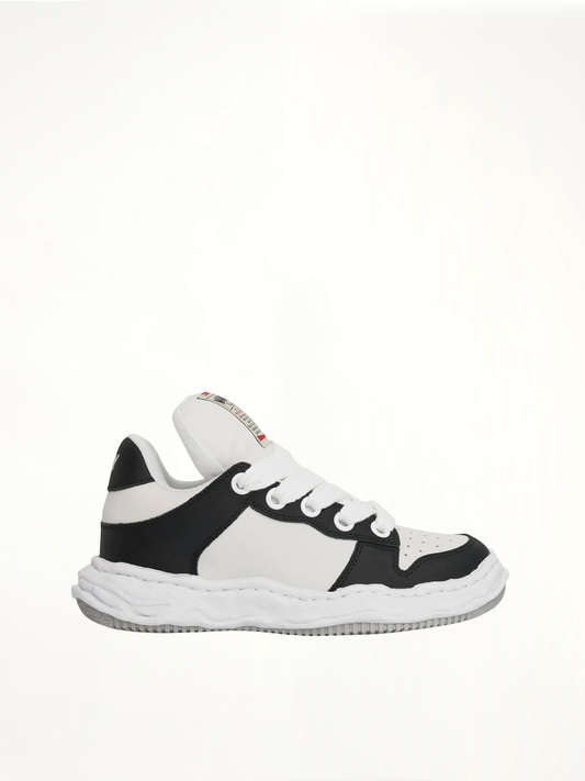 Image of Sneakers. Product name - Wayne OG Puffer Sneaker in Black colour by brand - MAISON MIHARA YASUHIRO
