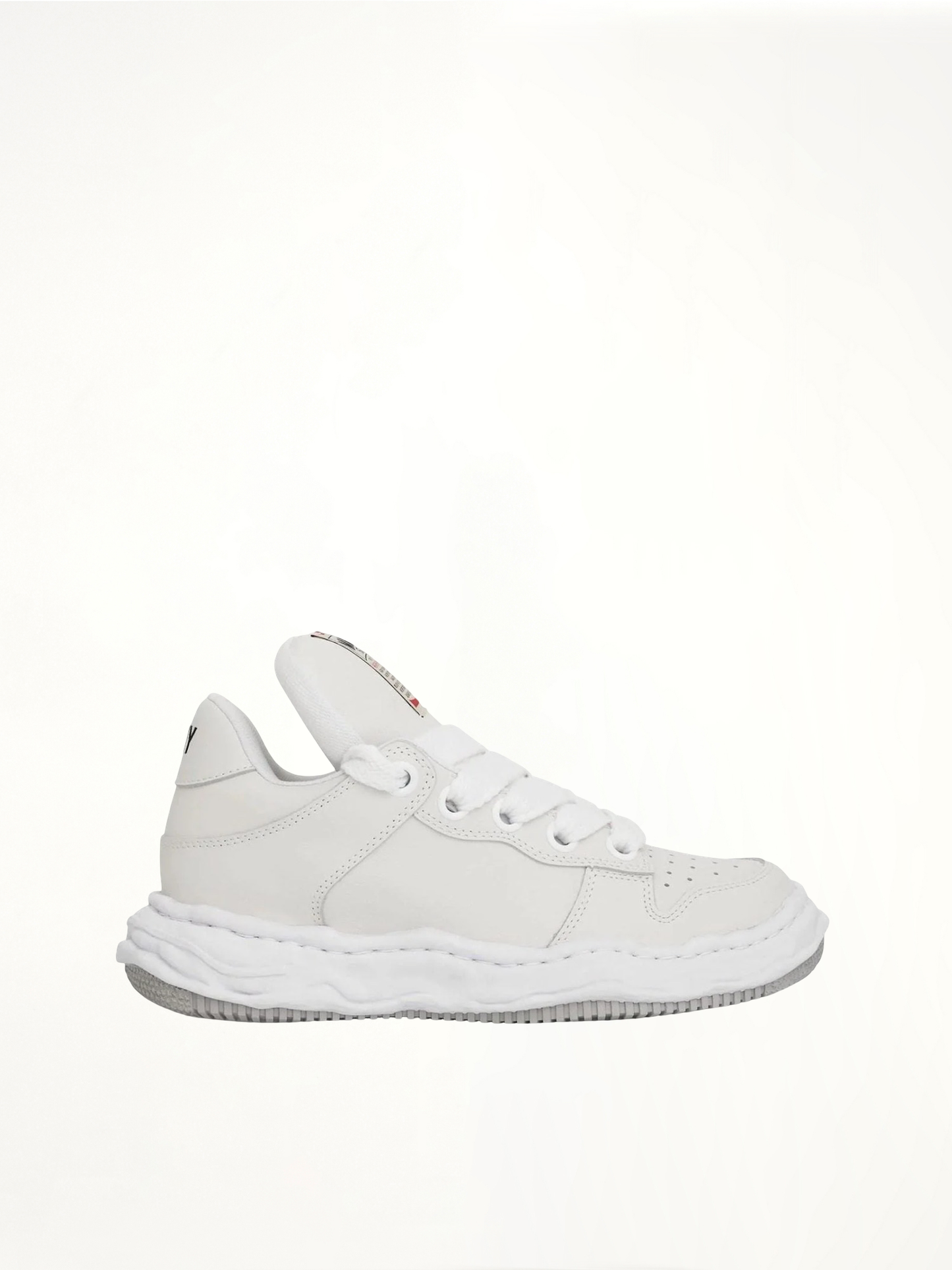 Image of Sneakers. Product name - Wayne OG Puffer Sneaker in White colour by brand - MAISON MIHARA YASUHIRO