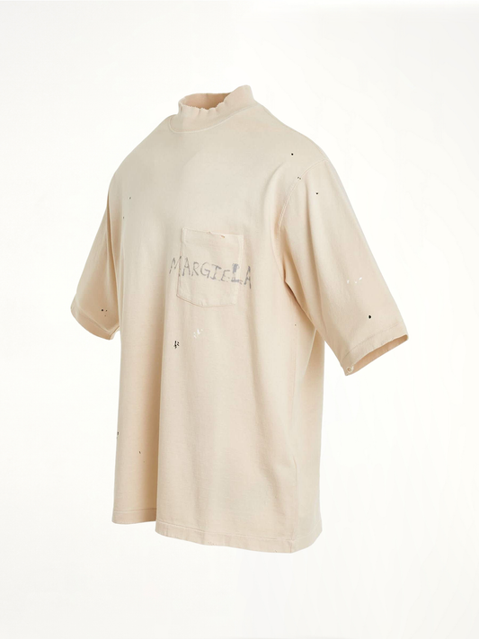 Image of a model wearing Tops. Productname: MAISON MARGIELA Logo Oversized T-Shirt in White colour by brand - MAISON MARGIELA