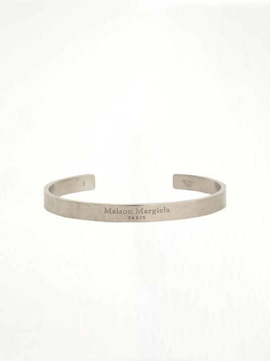 Image of Bracelets. Product name - Medium Margiela Logo Cuff Bracelet in Silver colour by brand - MAISON MARGIELA