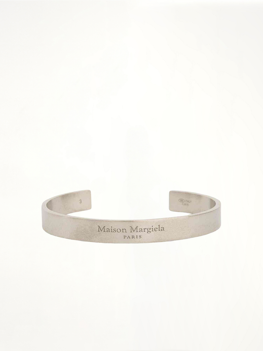 Image of Bracelets. Product name - Large Margiela Logo Cuff Bracelet in Silver colour by brand - MAISON MARGIELA