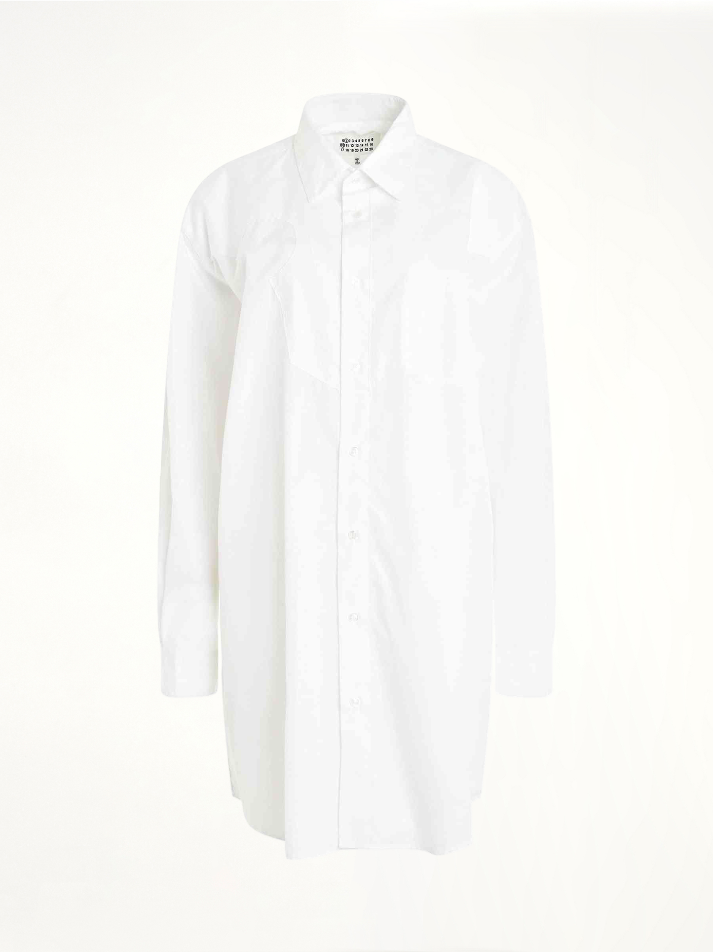 Image of a model wearing Tops. Productname: MAISON MARGIELA Long Sleeve Cotton Poplin Shirt in WHITE colour by brand - MAISON MARGIELA