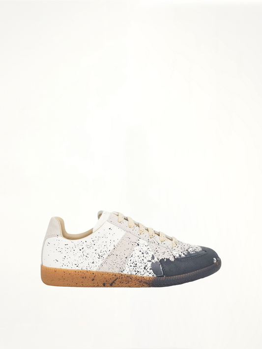 Image of Sneakers. Productname: MAISON MARGIELA Replica Paint Splatter Sneaker in WHITE colour by brand - MAISON MARGIELA