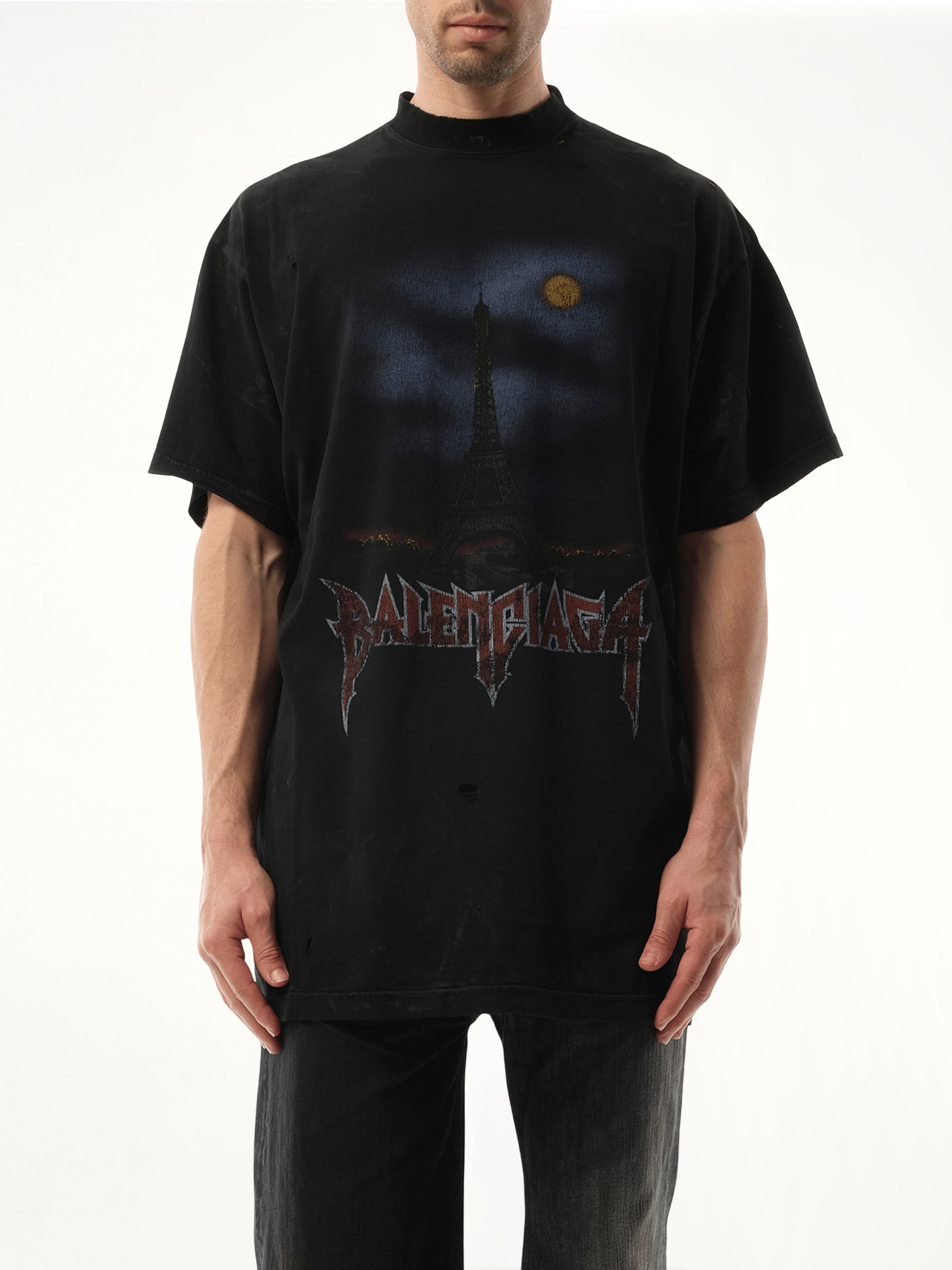 Image of a model wearing Tops. Productname: BALENCIAGA Paris Moon Oversized T-Shirt in Black colour by brand - BALENCIAGA