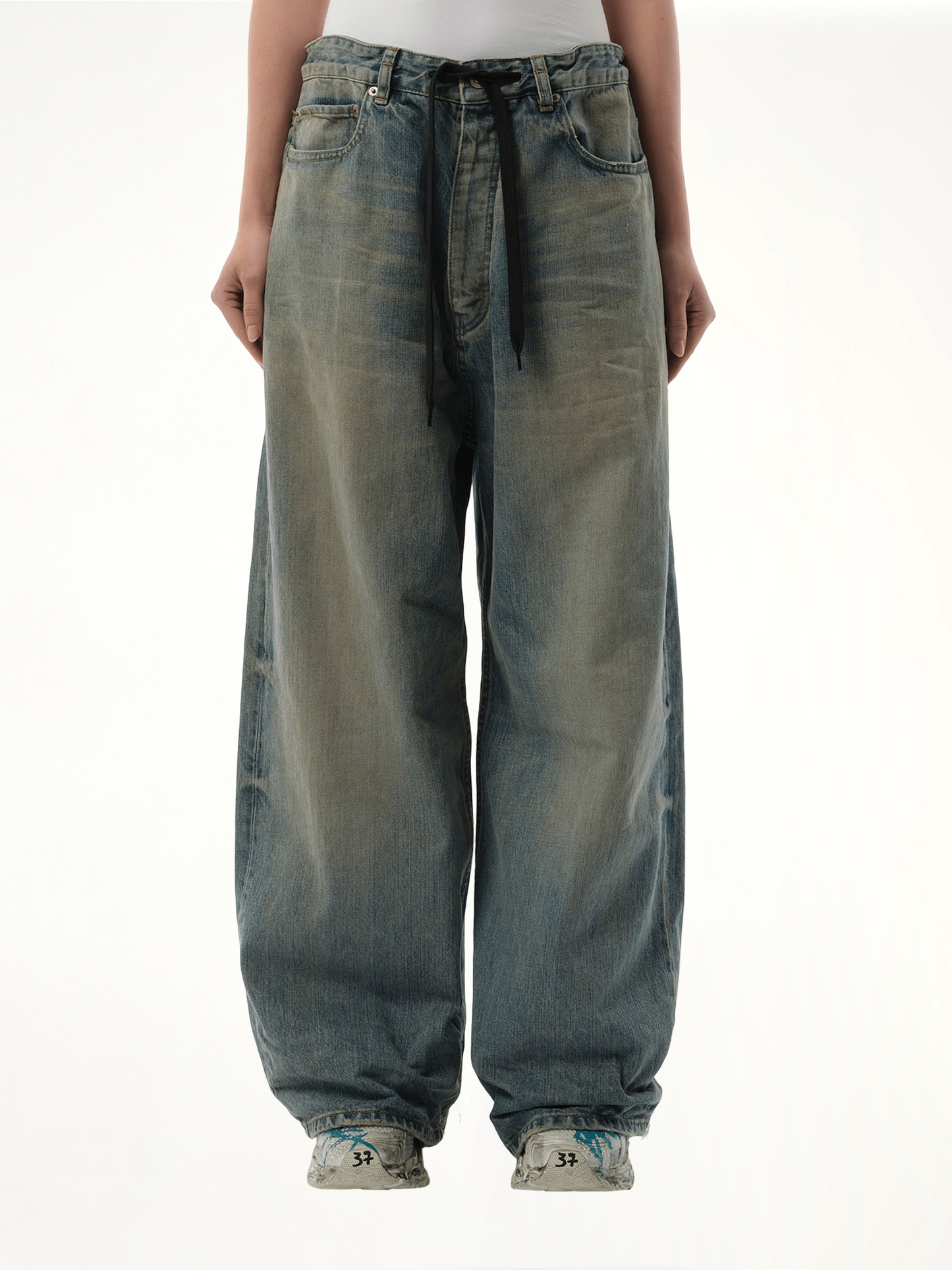 Image of a model wearing Denim. Productname: BALENCIAGA Oversized Baggy Jeans in Blue colour by brand - BALENCIAGA