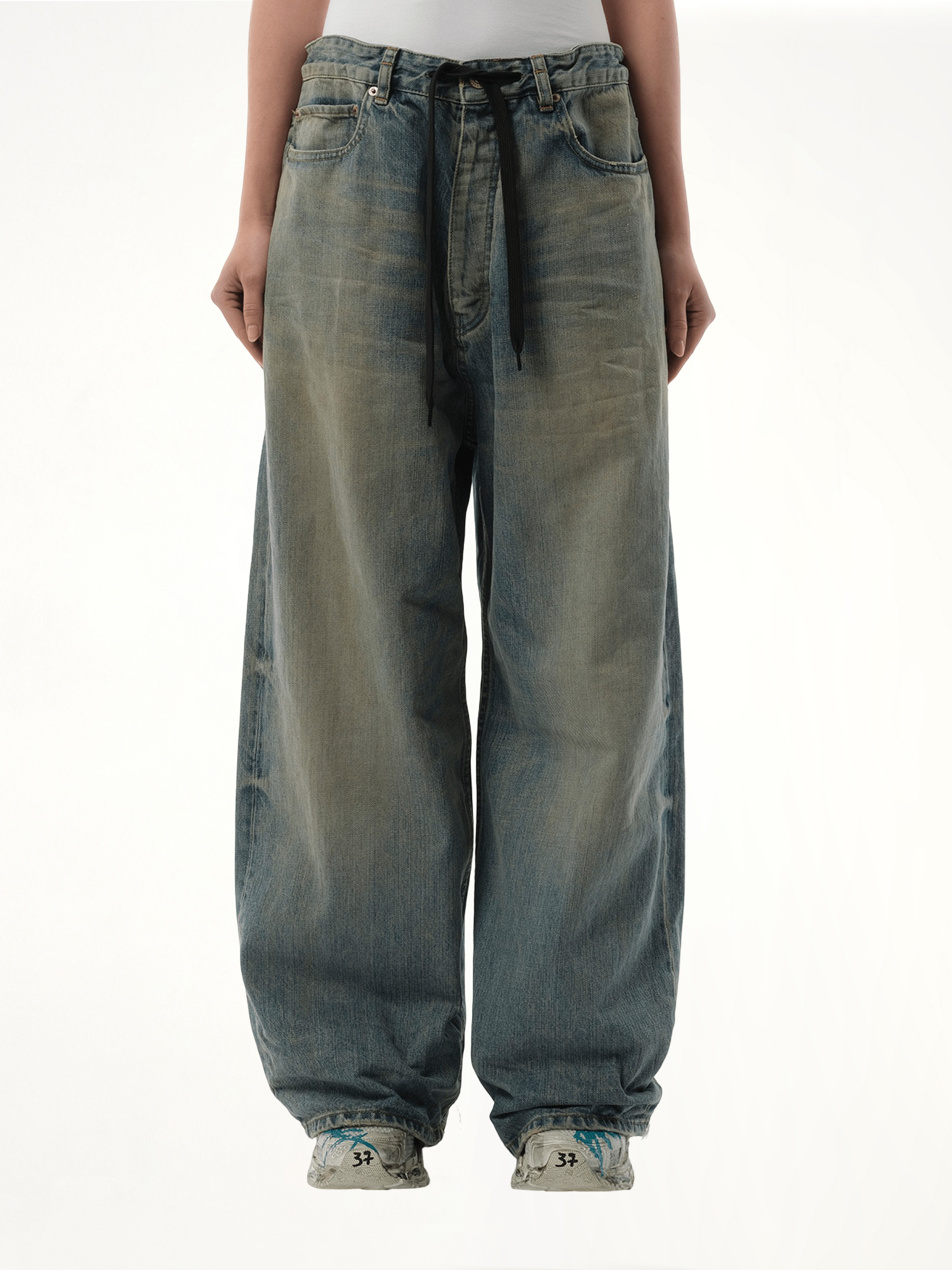 Image of a model wearing Denim. Productname: BALENCIAGA Oversized Baggy Jeans in Blue colour by brand - BALENCIAGA