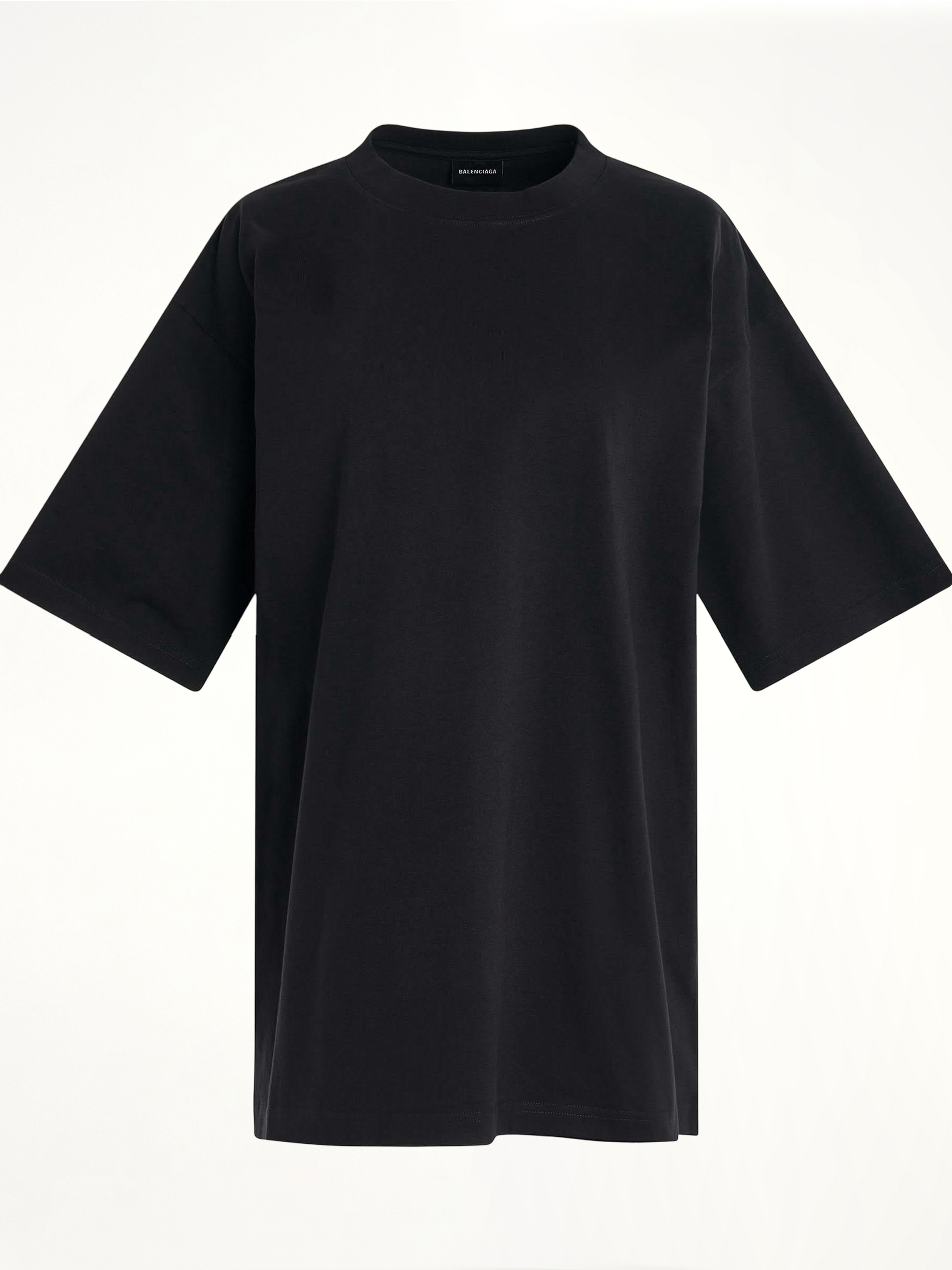 Image of a model wearing Tops. Productname: BALENCIAGA Handwritten Logo T-Shirt in BLACK colour by brand - BALENCIAGA