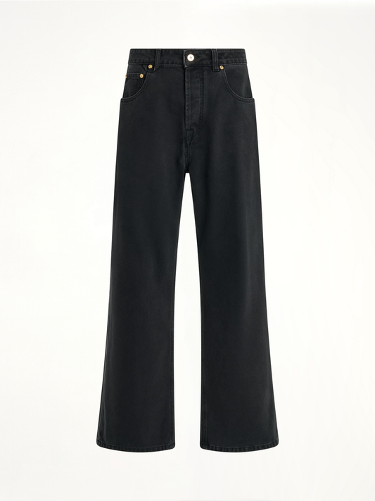 Image of a model wearing Denim. Productname: JACQUEMUS Le Denimes Large Jeans in BLACK colour by brand - JACQUEMUS