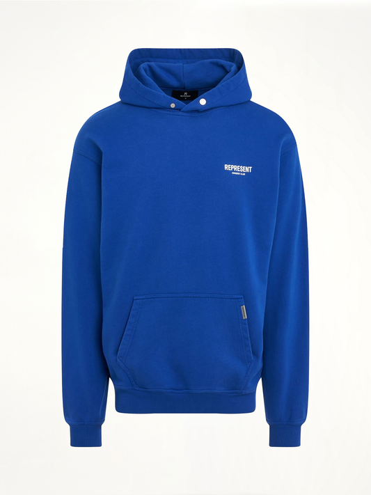 Image of a model wearing Outerwear. Productname: New Represent Owners Club Hoodie in Blue colour by brand - REPRESENT