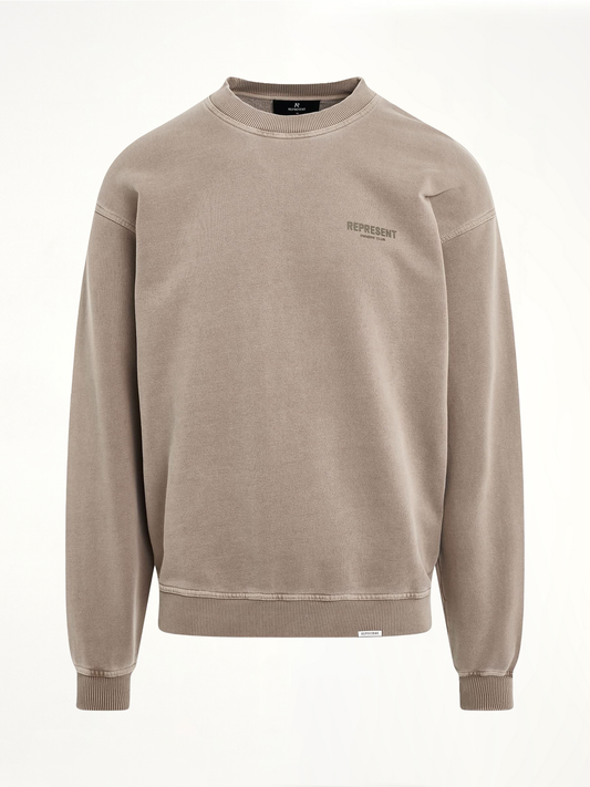 Image of a model wearing Outerwear. Product name - New Represent Owners Club Sweatshirt in Grey colour by brand - REPRESENT
