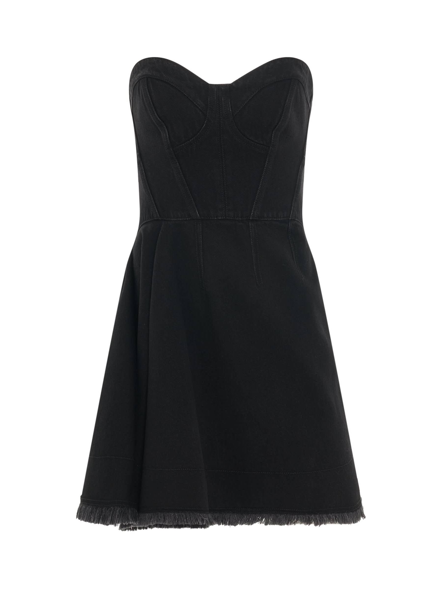 Image of a model wearing Denim. Productname: ALEXANDER MCQUEEN Mini Bustier Denim Dress in Black colour by brand - ALEXANDER MCQUEEN