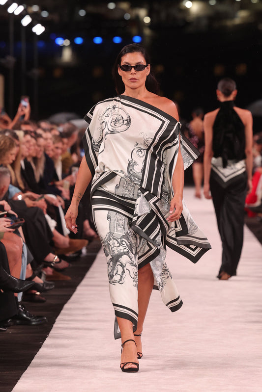 Image of a model wearing Tops. Product name - Rococo Silk Twill Peak Hem Scarf Top in White colour by brand - Carla Zampatti