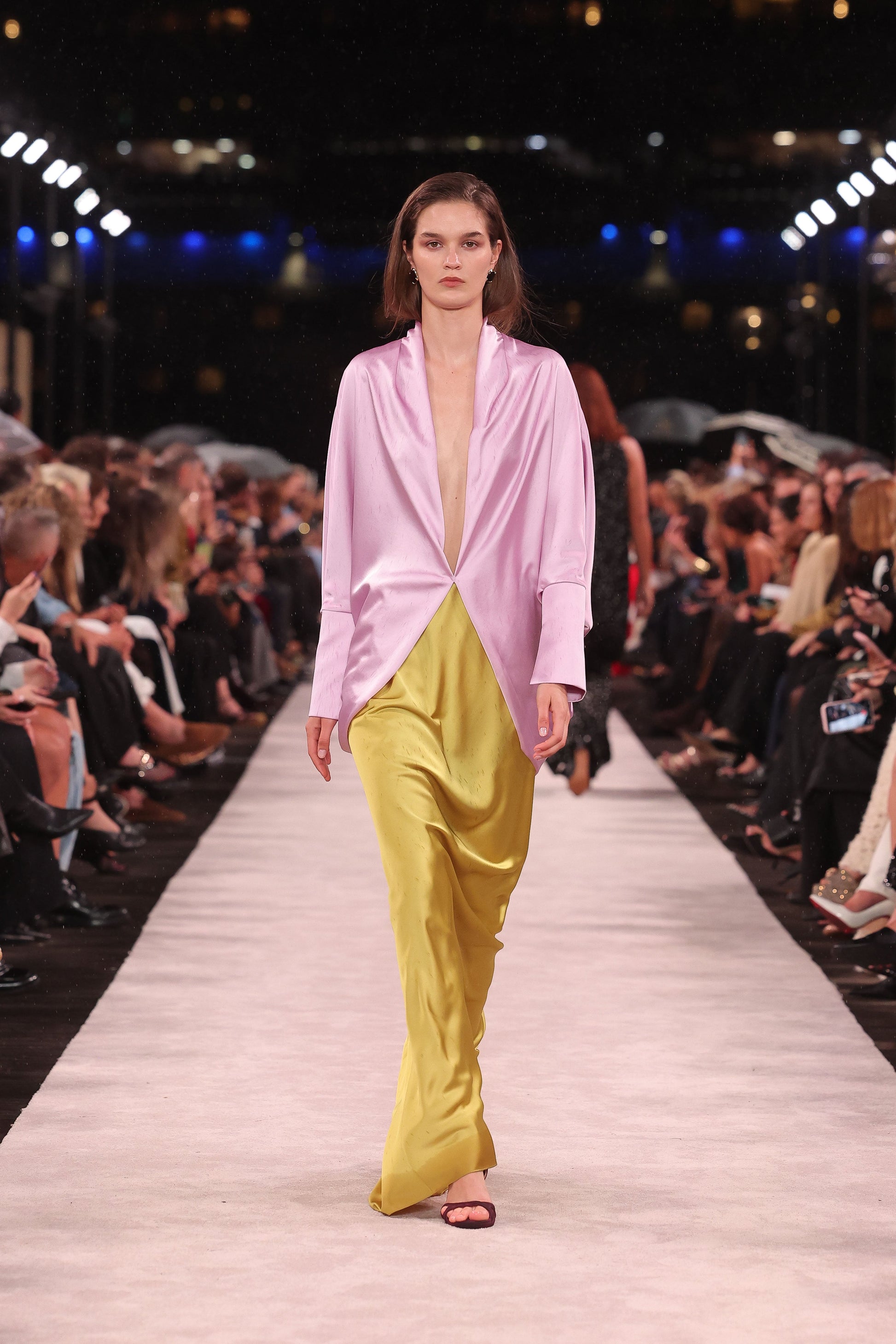 Image of a model wearing Skirts. Product name - Pear Lustre Satin Bias Skirt in Black colour by brand - Carla Zampatti