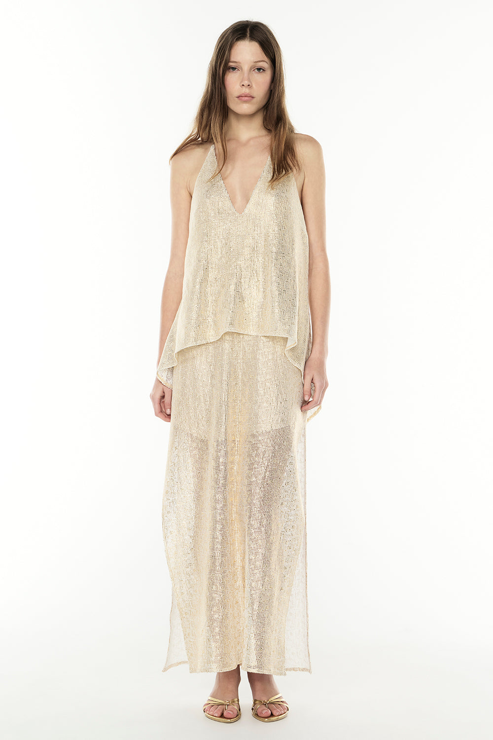 Image of a model wearing Tops. Productname: Illuminated Halter Dress in GOLD colour by brand - Manning Cartell