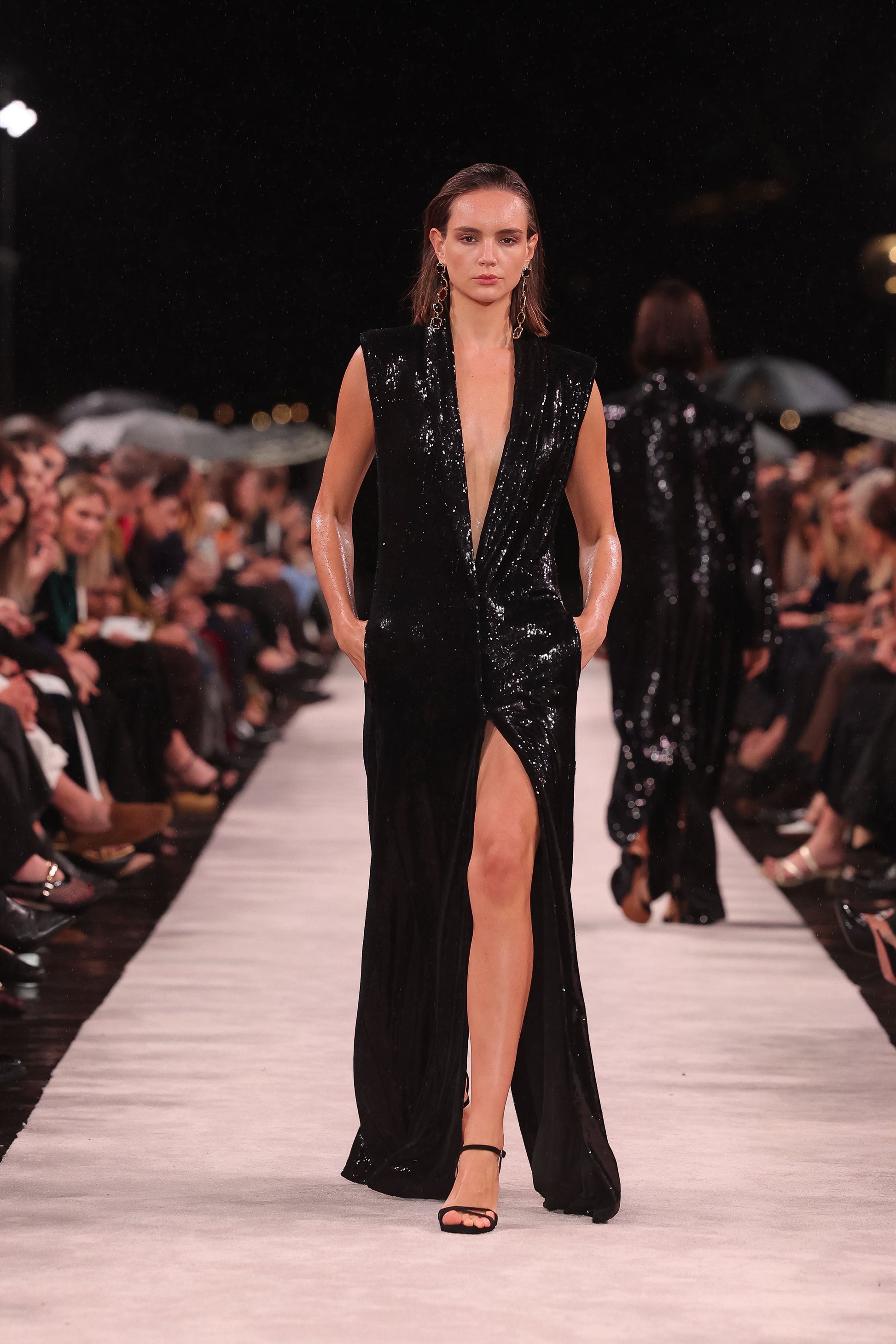 Image of Coats & Jackets. Product name - Black Liquid Seqiun Long Line Vest in Black colour by brand - Carla Zampatti