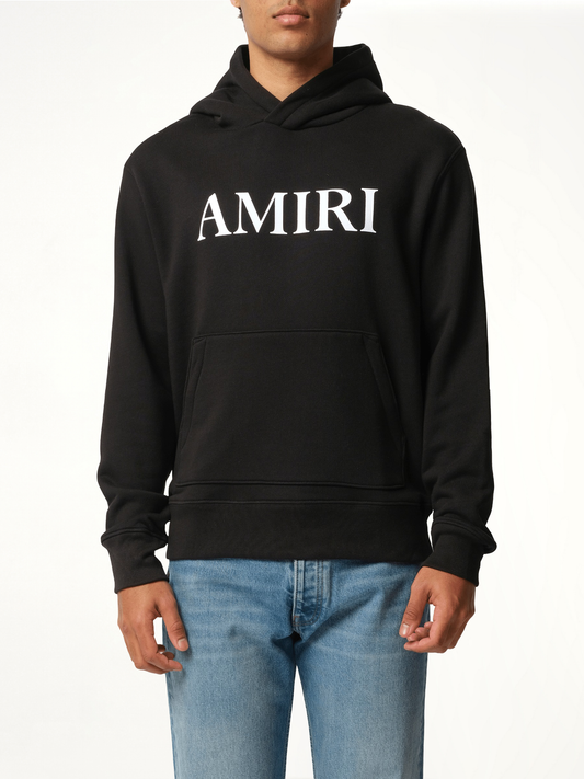 Image of a model wearing Outerwear. Productname: Amiri Core Logo Hoodie in Black colour by brand - AMIRI