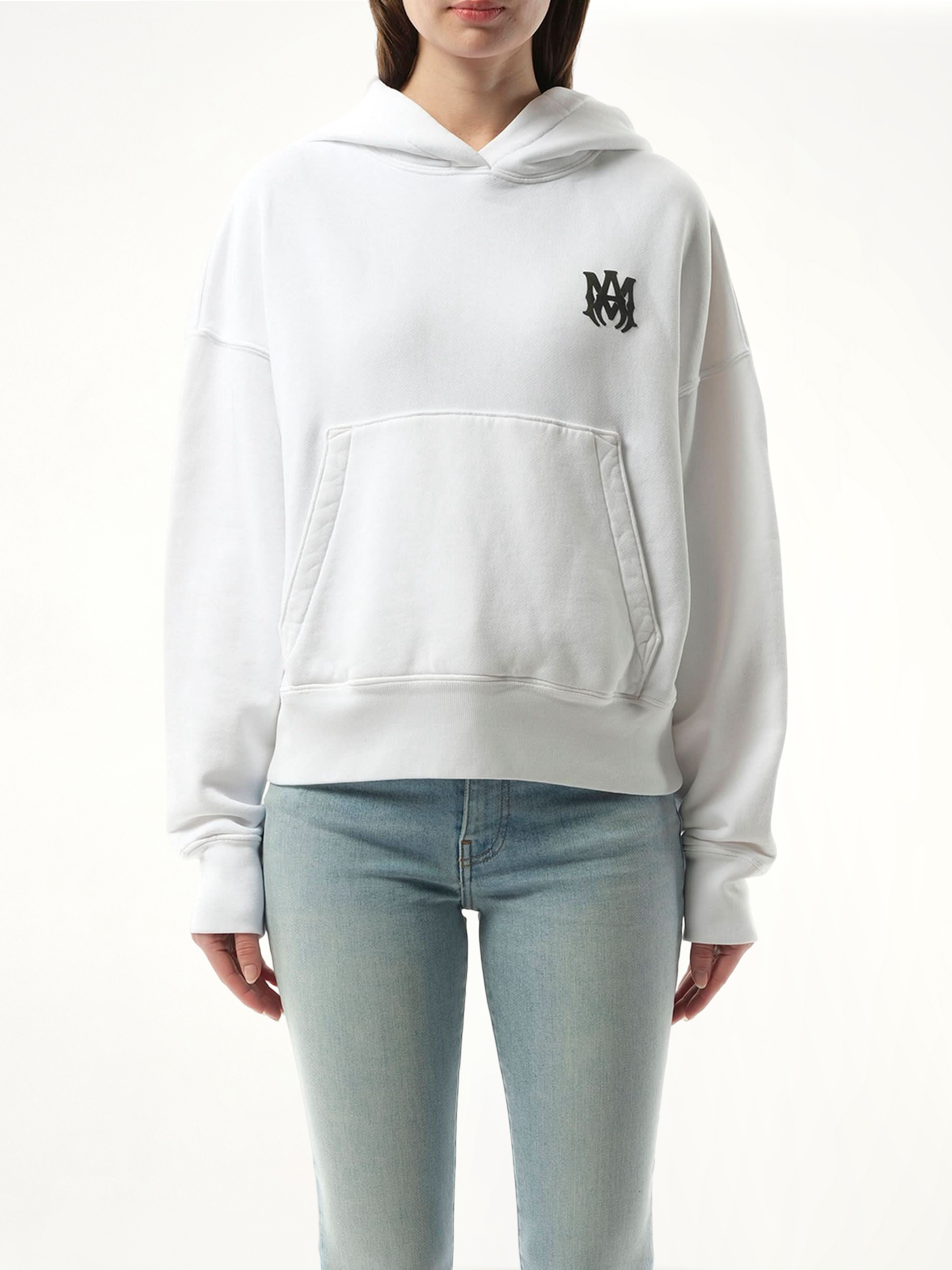 Image of a model wearing Outerwear. Product name - MA Core Logo Hoodie in White colour by brand - AMIRI