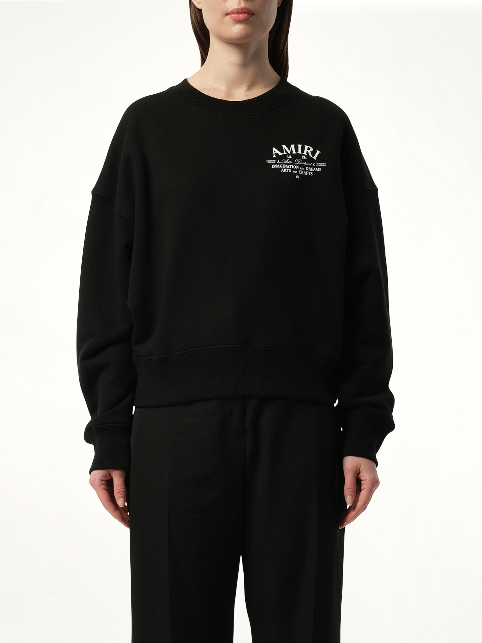 Image of a model wearing Outerwear. Product name - Amiri Arts District Sweatshirt in Black colour by brand - AMIRI