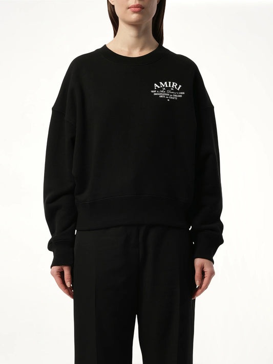 Image of a model wearing Outerwear. Product name - Amiri Arts District Sweatshirt in Black colour by brand - AMIRI